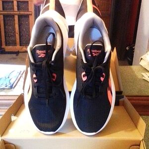 Women's Black Reebok Running Shoes with neon orange/pink accents. Size 8.5 U.S.